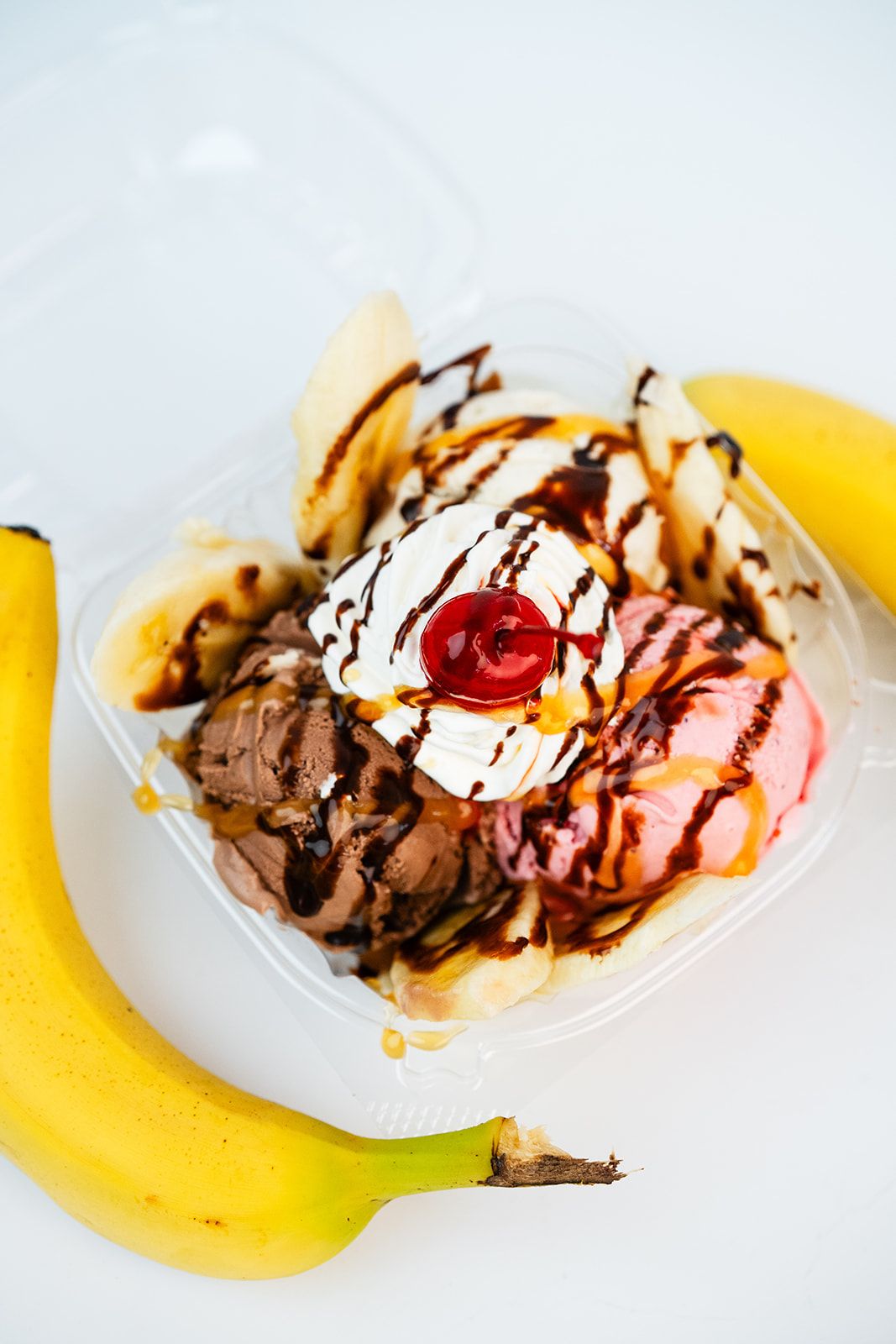 A Las Delicias banana split with ice cream and toppings