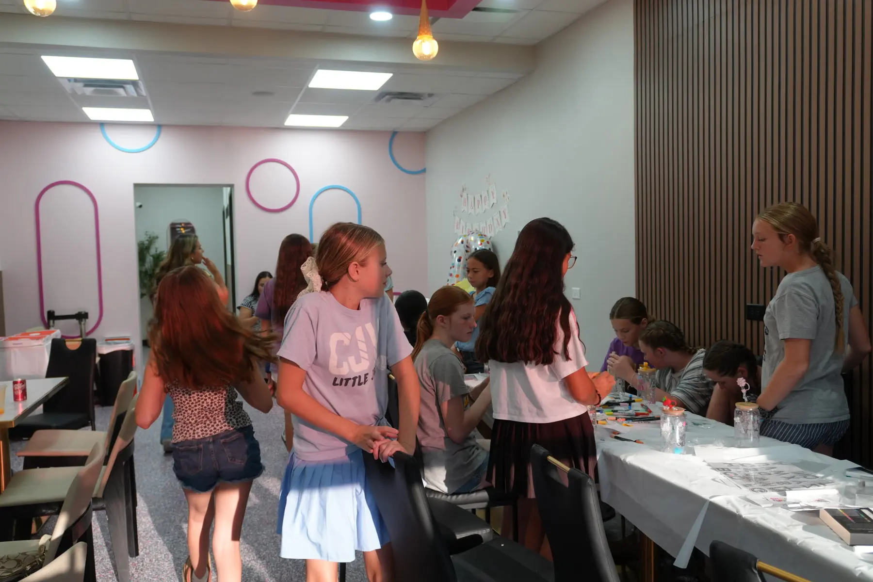 Tables and chairs in the party room.